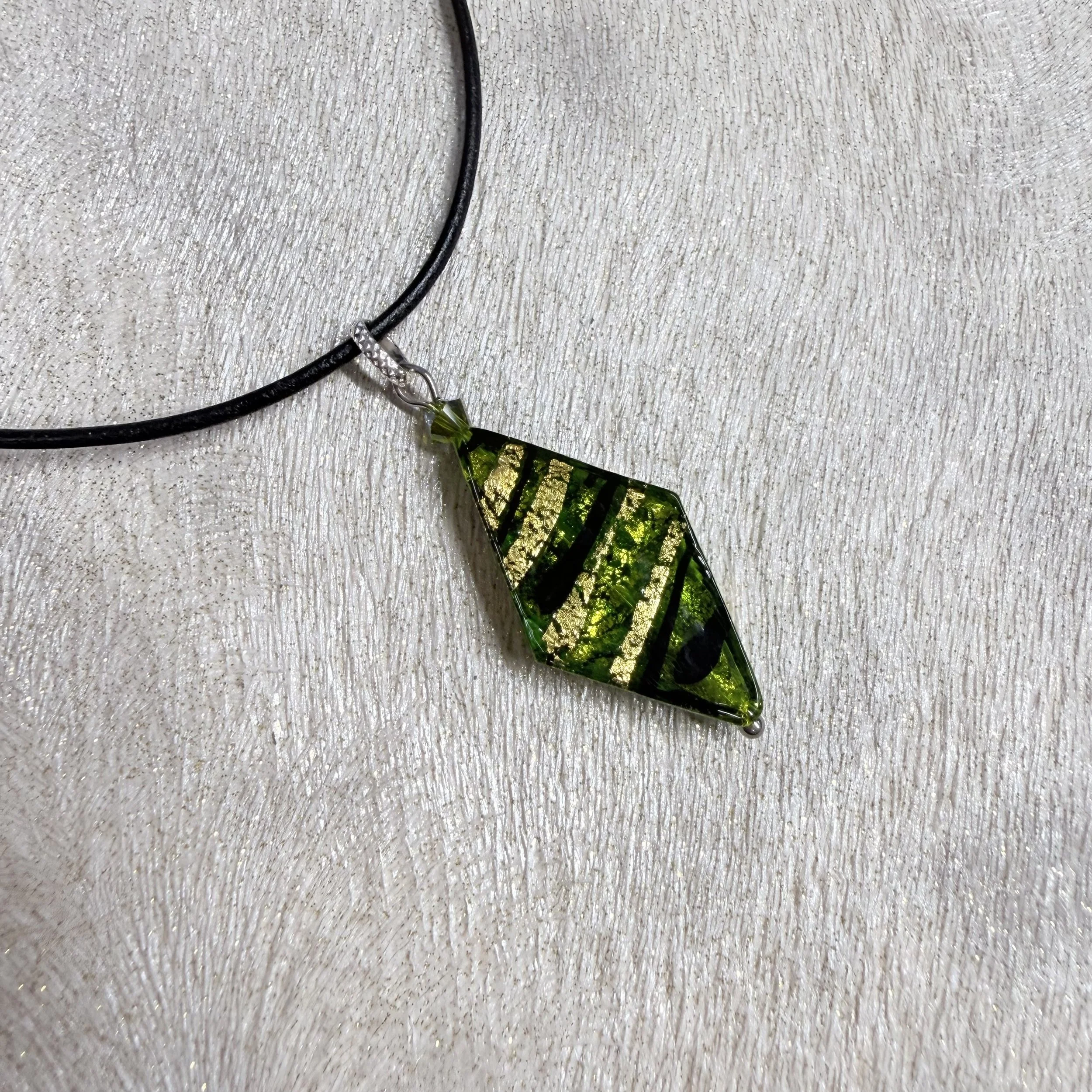 Green Murano on black leather cord