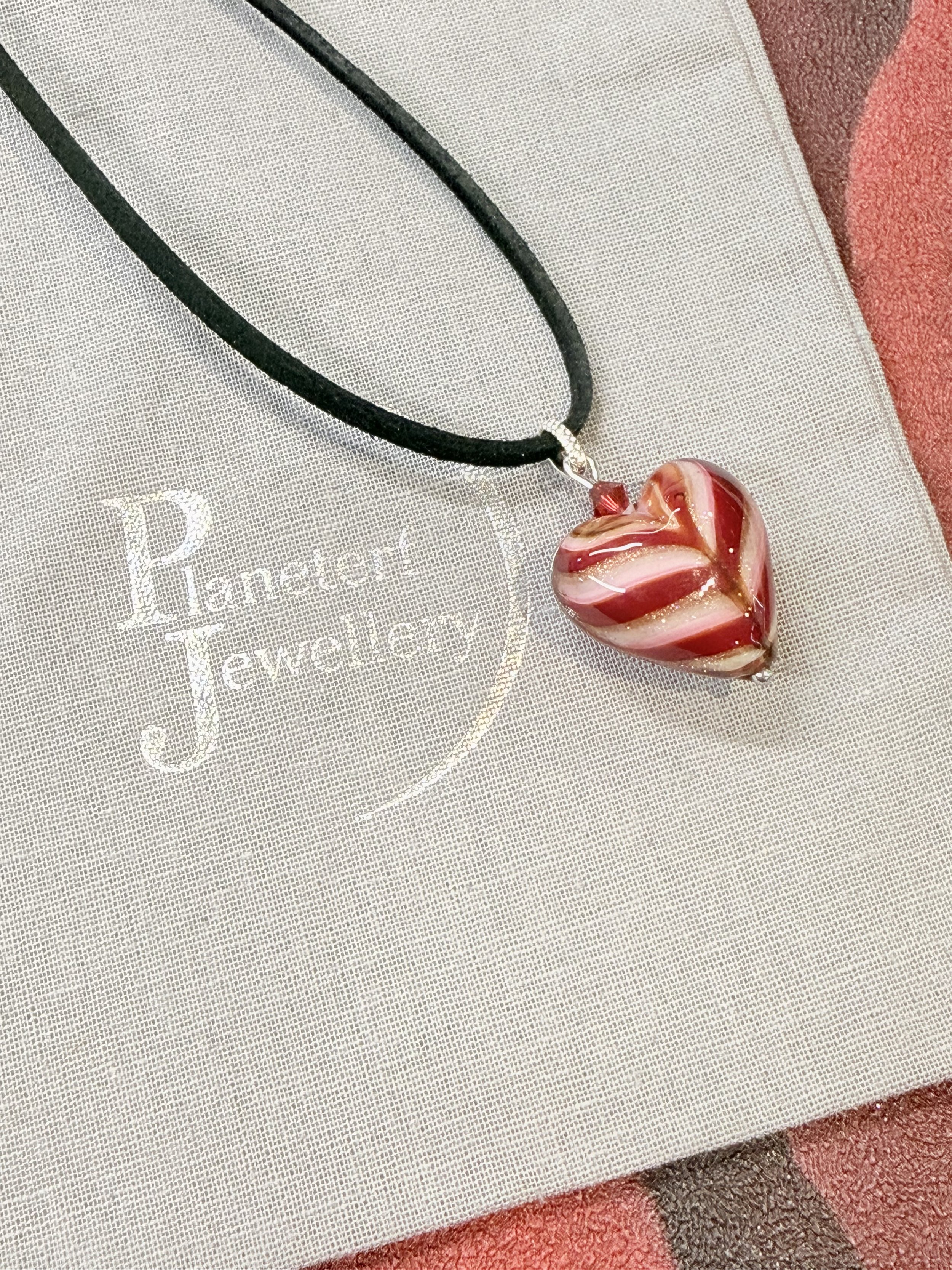 Murano red heart on faux suede cord