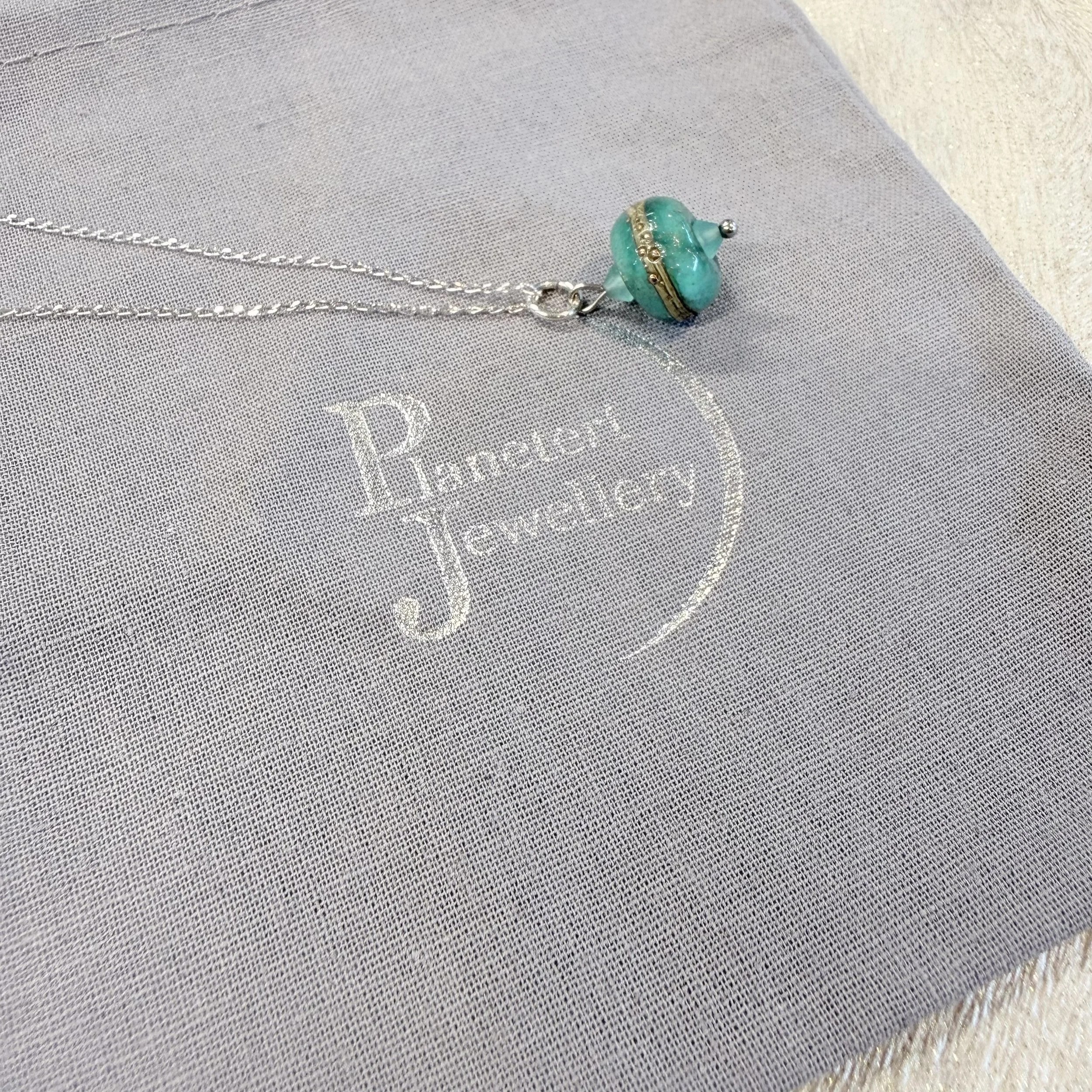 Green lampwork glass bead on sterling silver chain