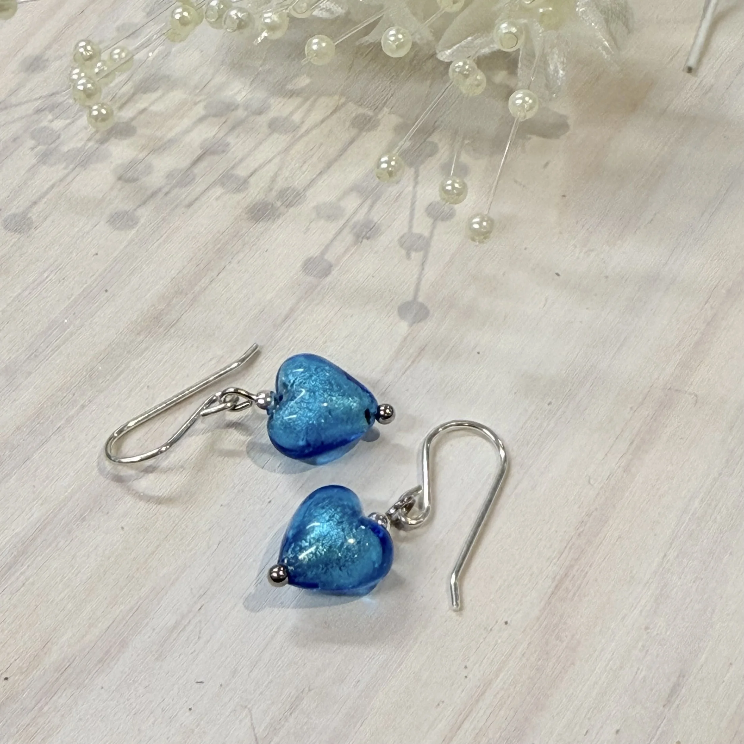 Blue Murano hearts on sterling silver