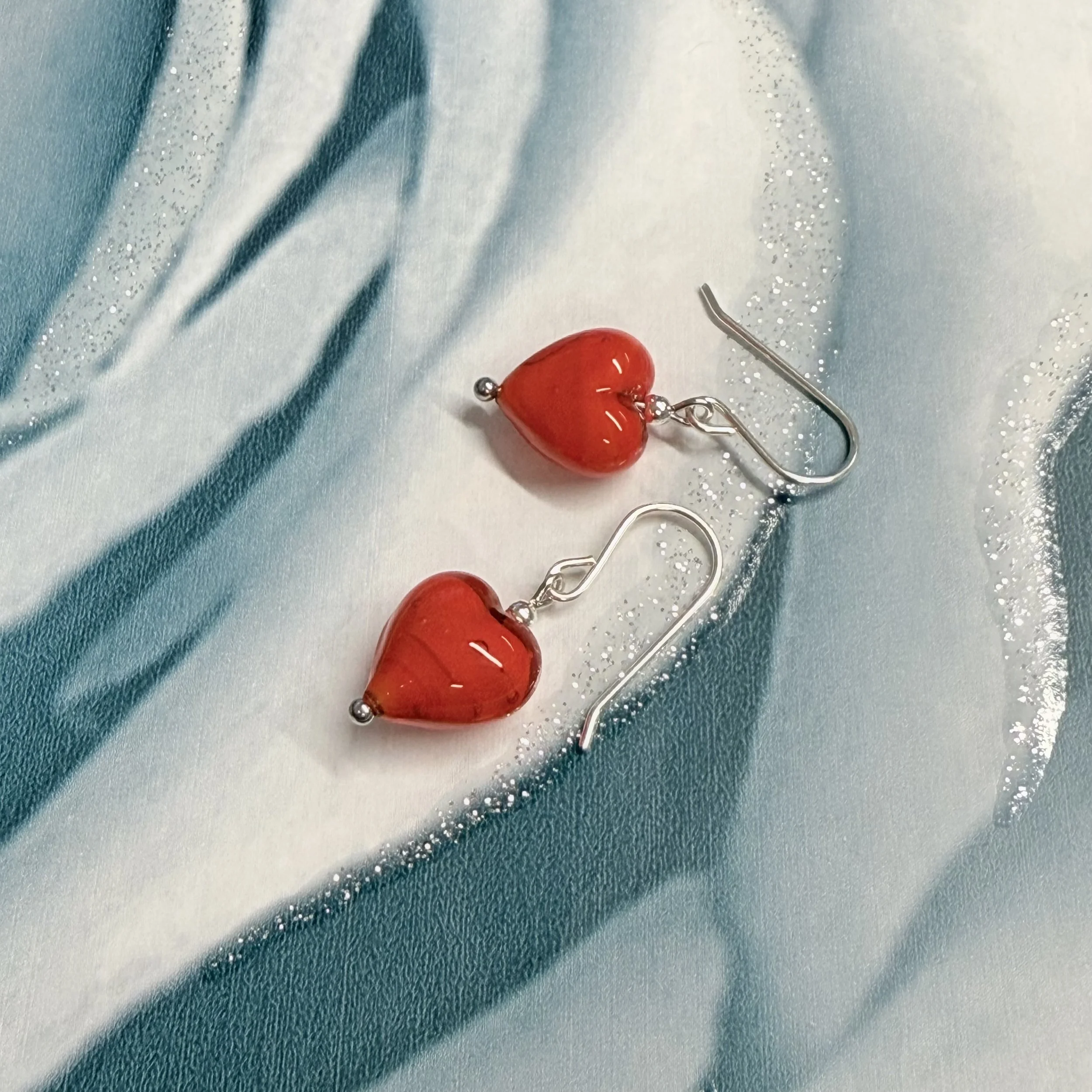 Orange-red Murano hearts on sterling silver earwires