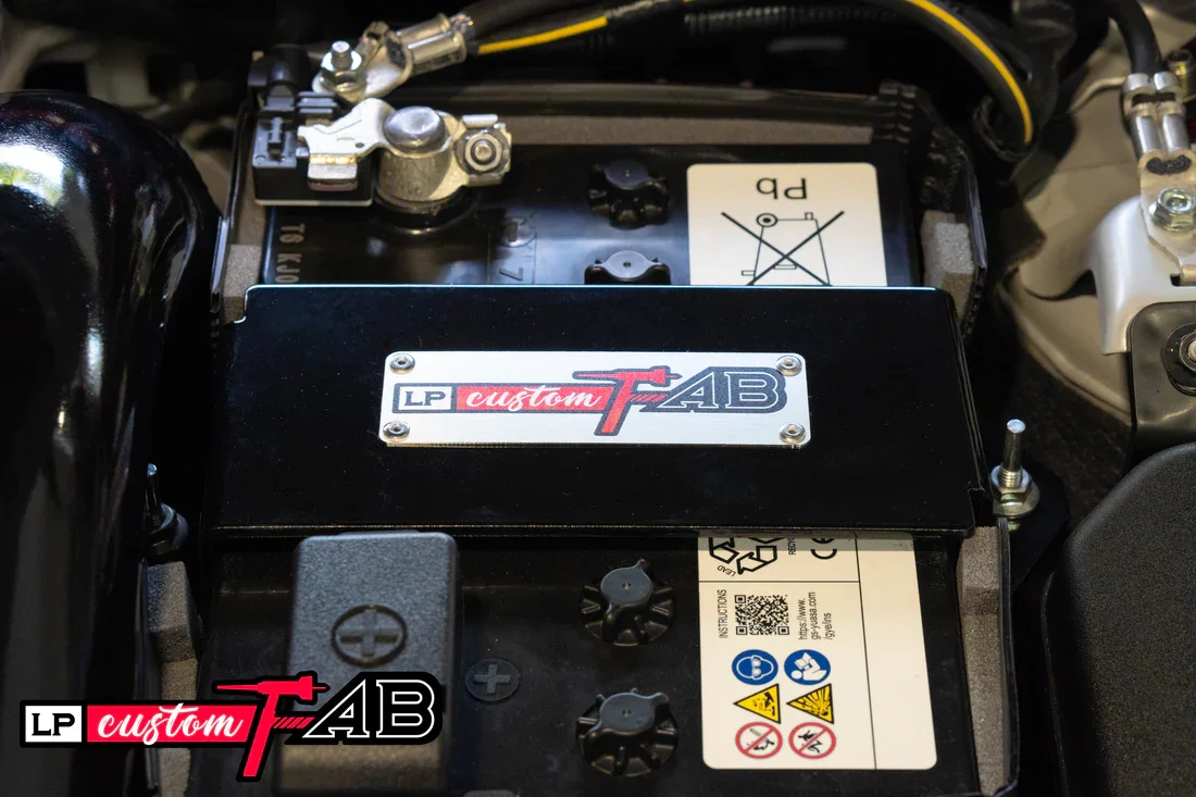 LPCustomFab Mazda3 Battery Mount Installed.webp