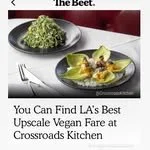 Close-up of a plate of guacamole with tortilla chips on a table