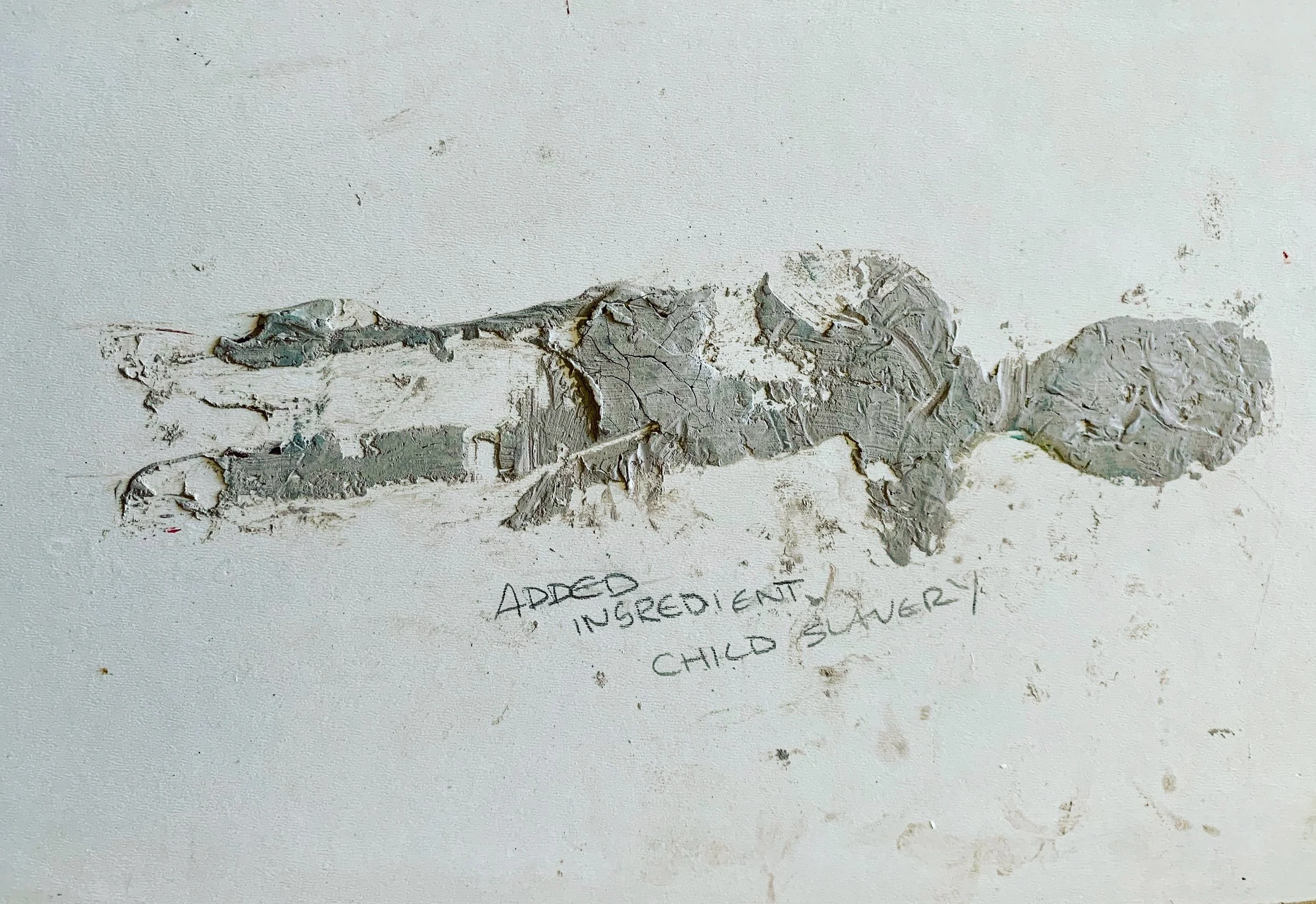 A damaged area of white wall with torn and peeling paint and underlying drywall visible. Handwritten notes are partially visible below the damaged section.
