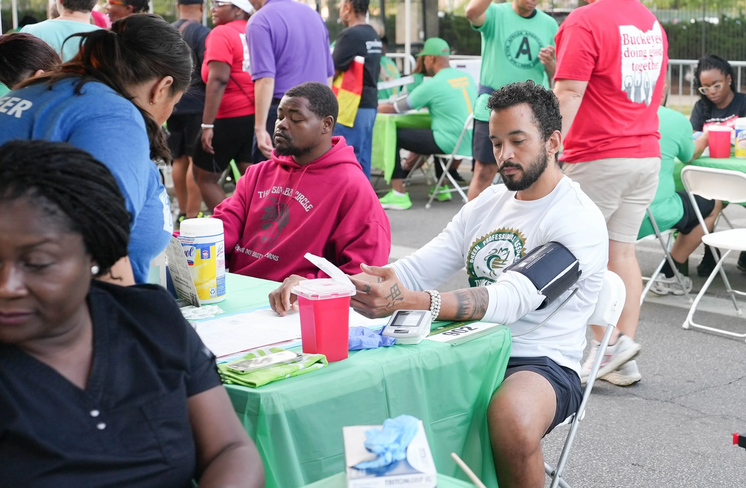 Person getting their blood pressure screened at Black Men’s Wellness Day in Columbus, OH.
