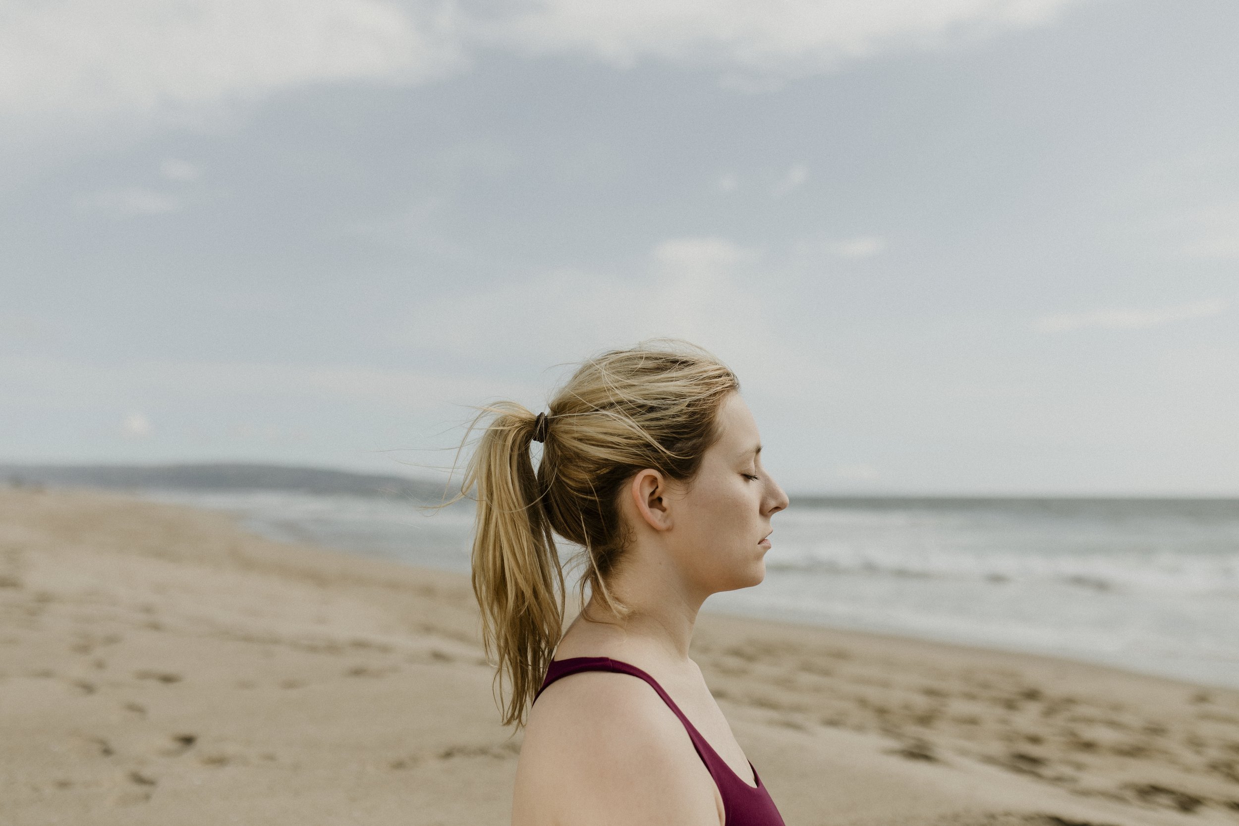 woman-meditating-beach.jpg