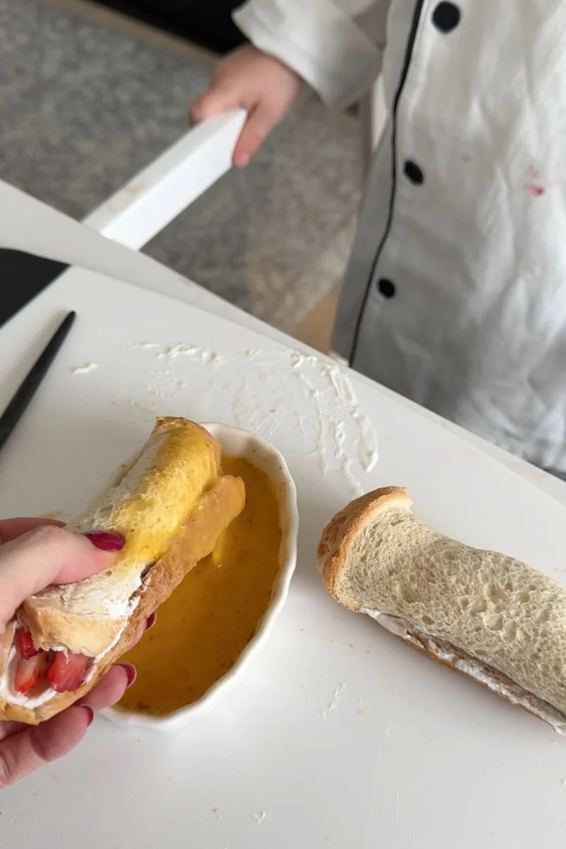 dipping stuffed french toast in egg mixture