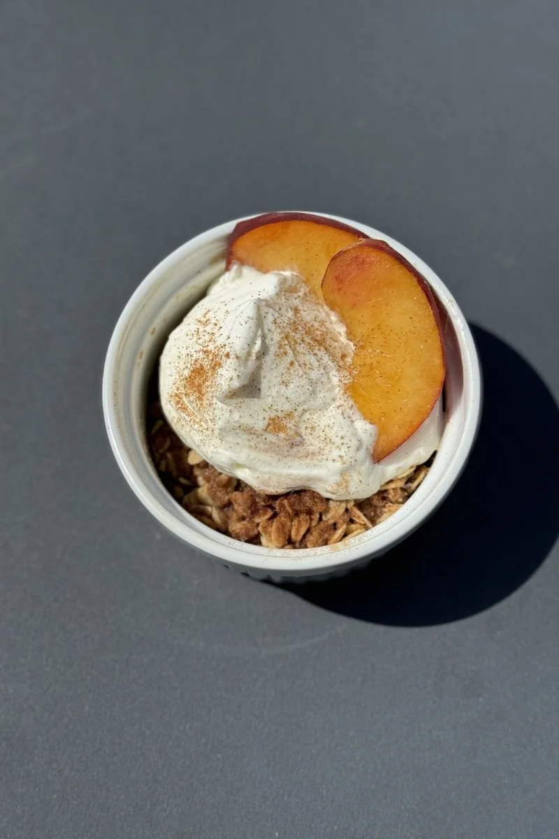 a ramekin full of peach dessert