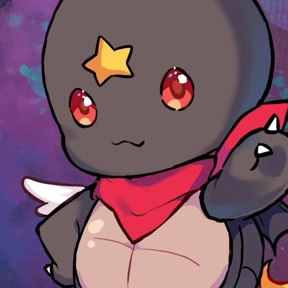 Kami-Con's mascot, Shoyu. A black turtle with red eyes, a gold star on his forehead, one white feathered wing and one black bat-like wing. He wears a red bandana around his neck.