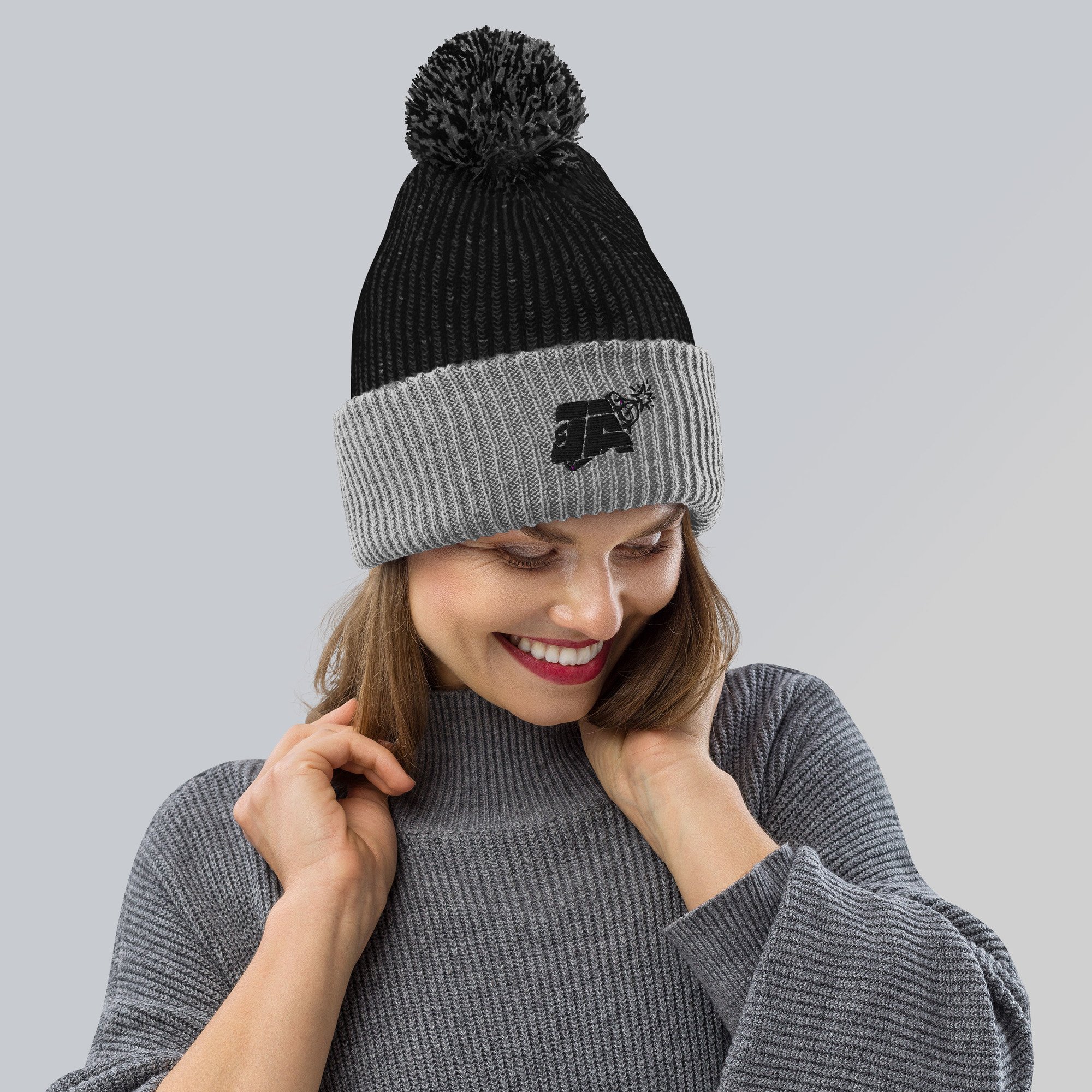 speckled-pom-pom-beanie-black-grey-front-63b4af27d72f3.jpg