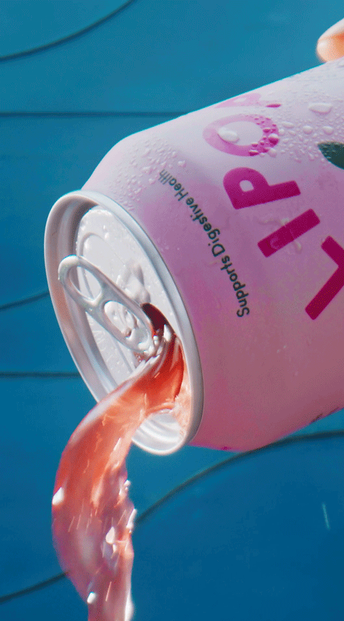Olipop can pouring liquid drink in streaming flow of soda. 