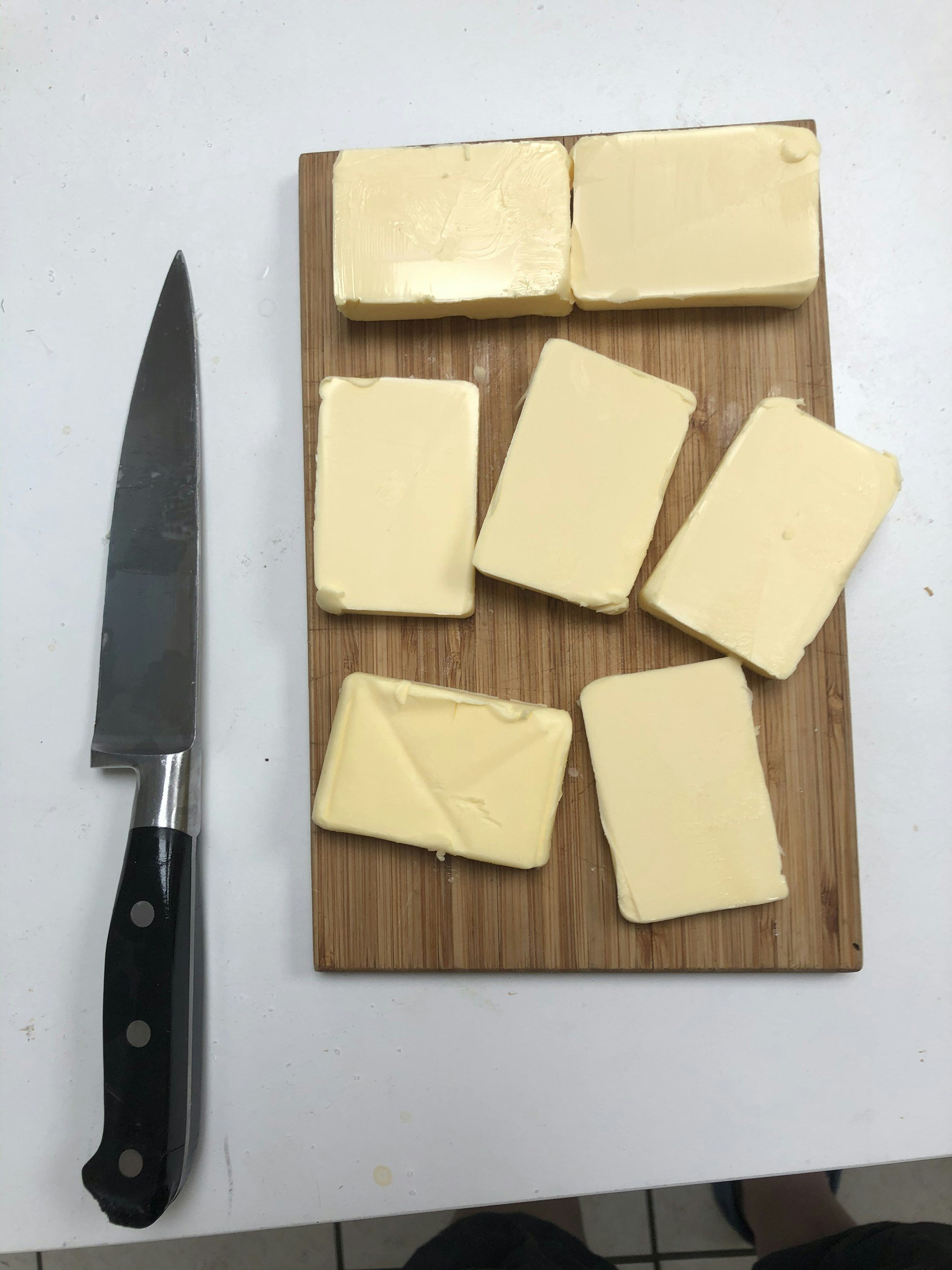 Cheese slices on a cutting board