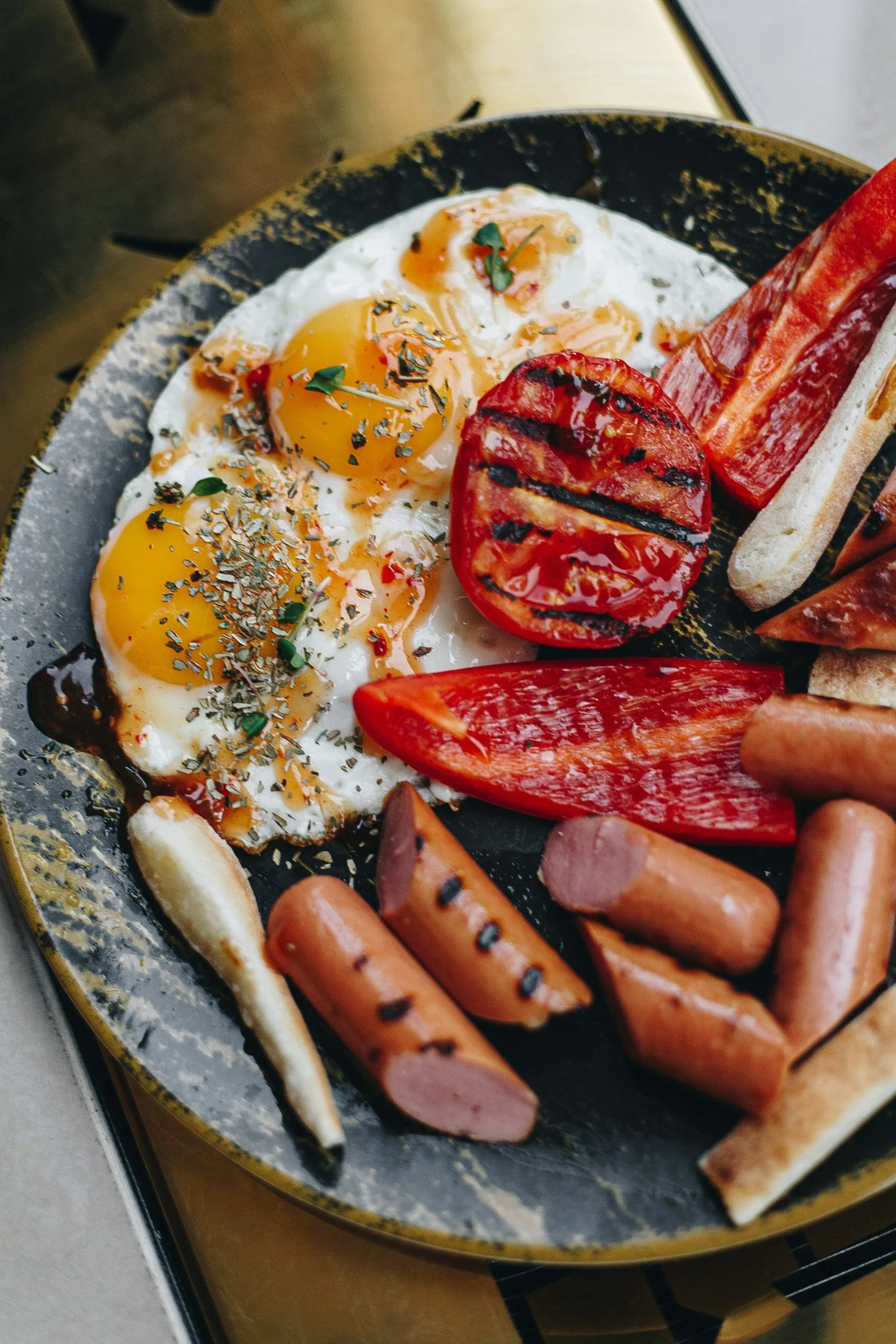 Eggs, sausage, and peppers in a bowl