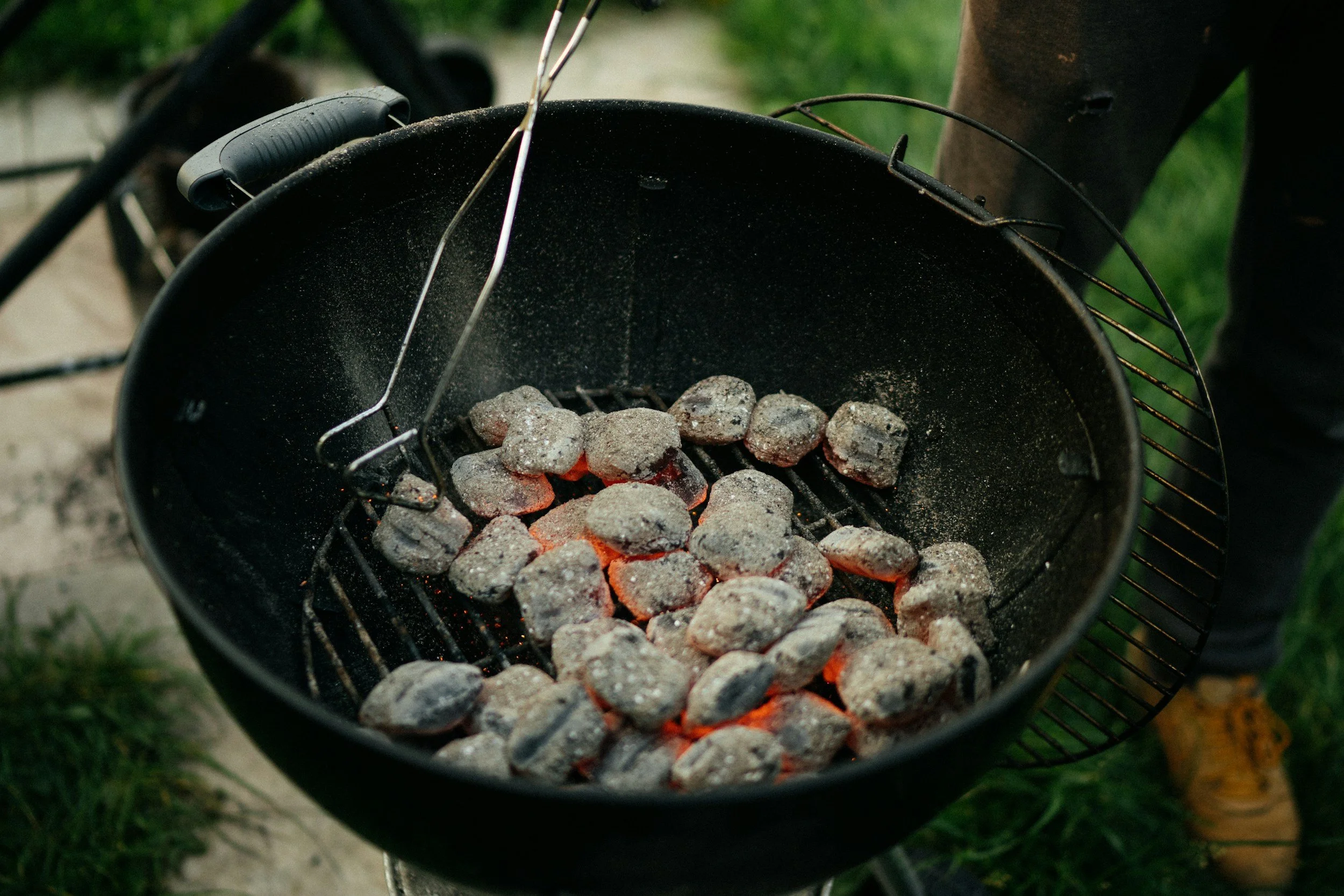 Charcoal briquettes inside a grill
