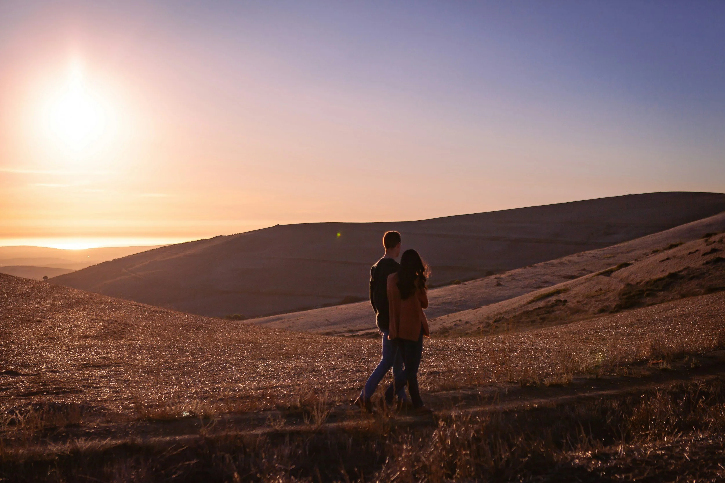 Merging paths representing teamwork, communication, and renewed trust in couples therapy.