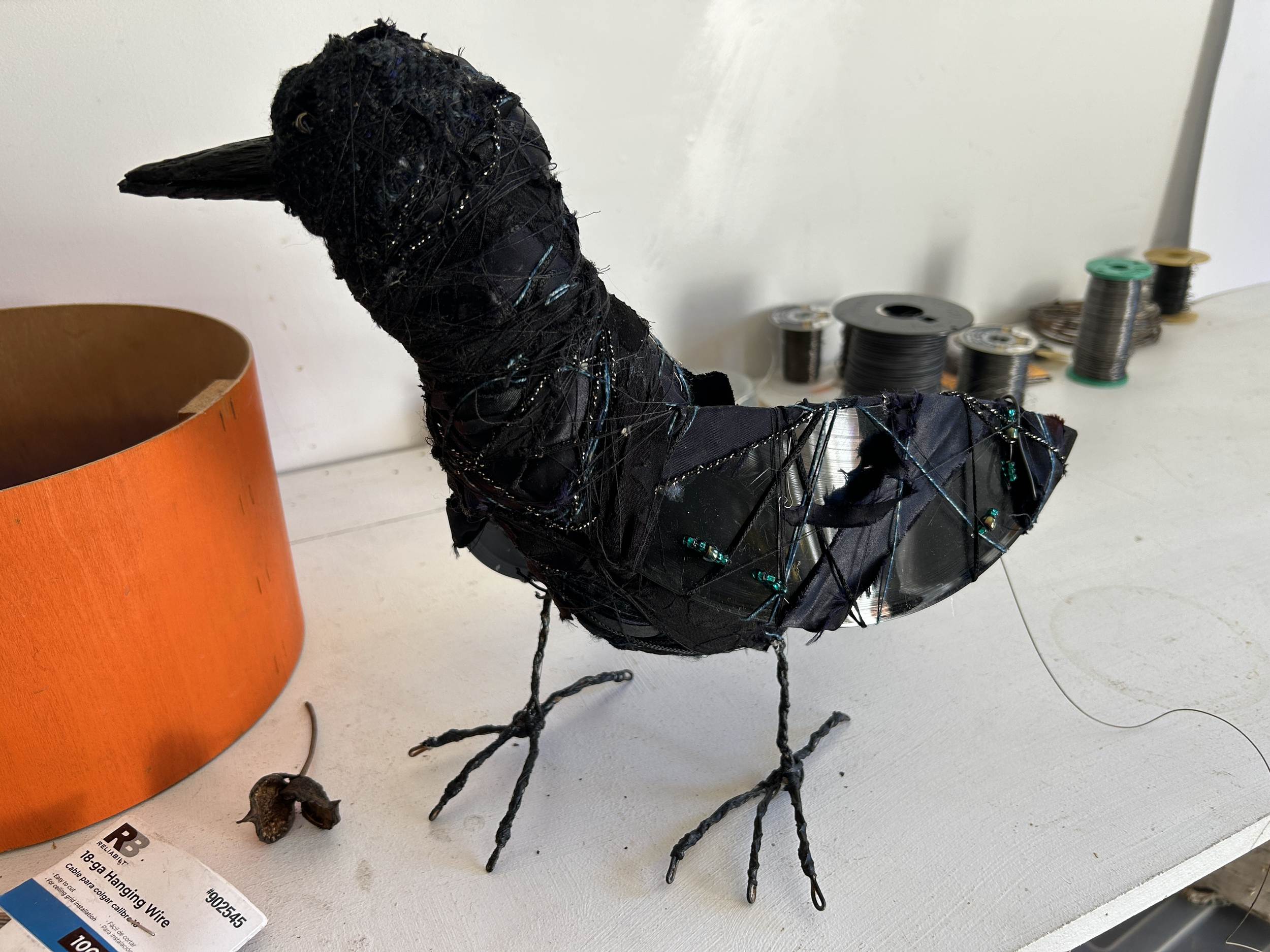 Crow sculpture made from recycled mateials