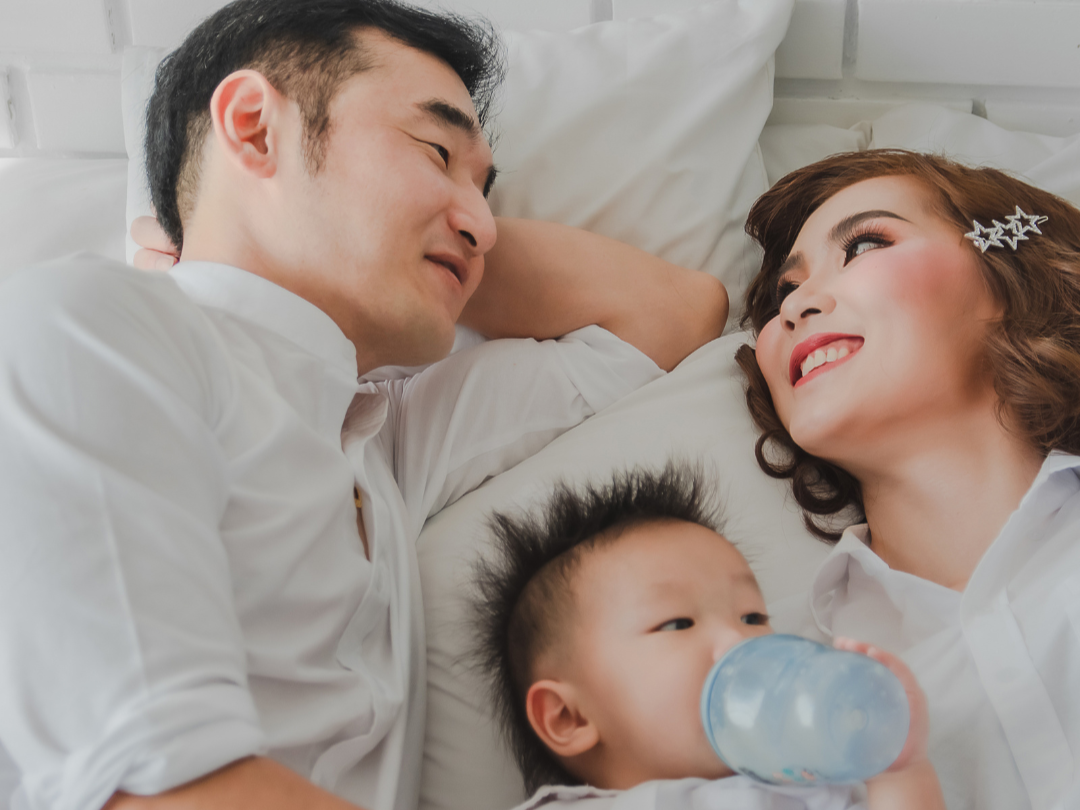 Parents with a young child representing the importance of estate planning and guardianship planning for families in Garner, North Carolina.