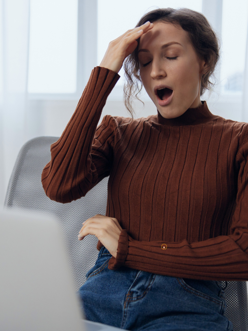 Woman looking stressed while reviewing paperwork about adding a child to a deed in North Carolina, highlighting estate planning risks in Garner and Wake County.