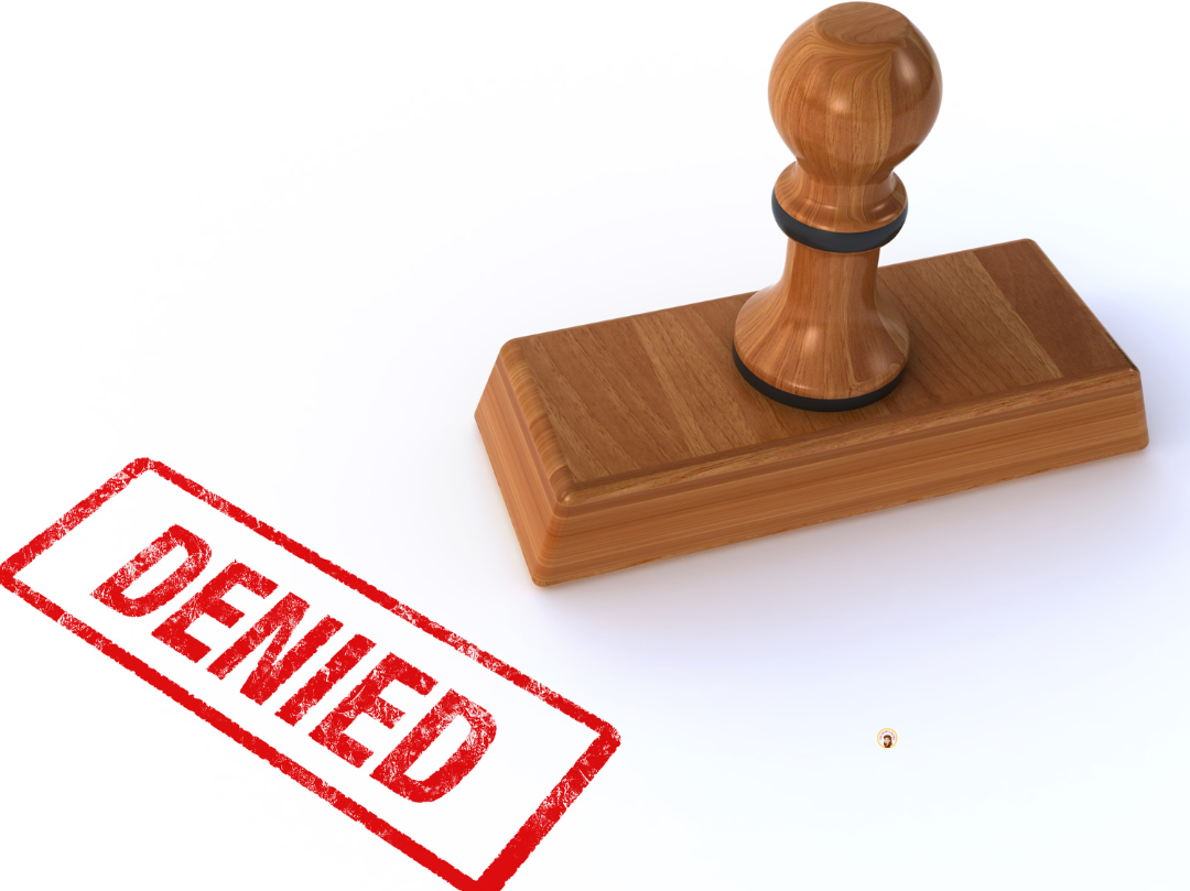 Rubber stamp marked denied symbolizing Medicaid transfer penalties that can occur when adding a child to a deed in North Carolina.