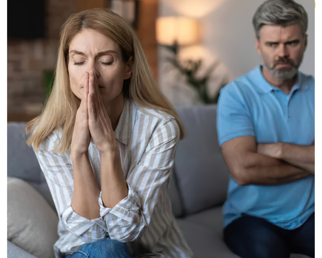 Adult family members experiencing disagreement and tension over an inheritance during the estate administration process.