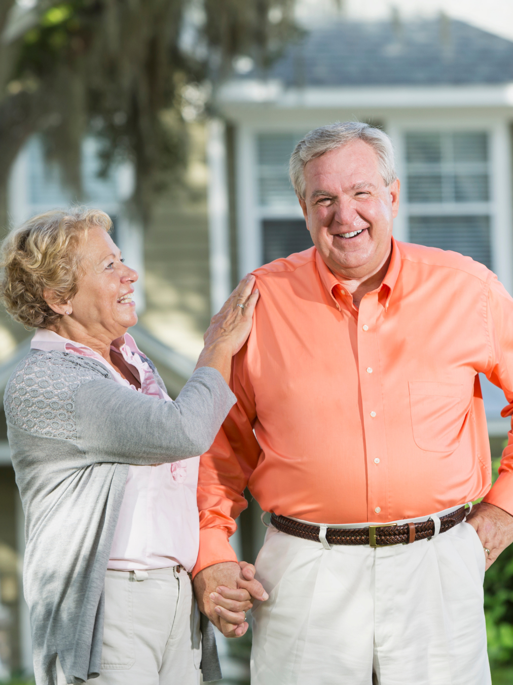 elderly couple in front of home wondering if medicaid can take their house in nc