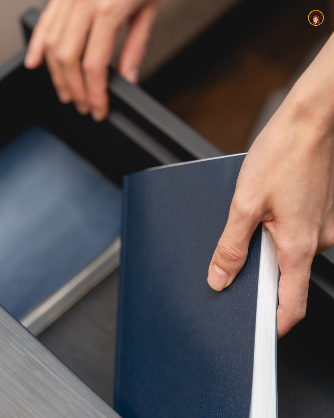 Woman placing her signed will into a drawer for safekeeping after completing her estate plan.