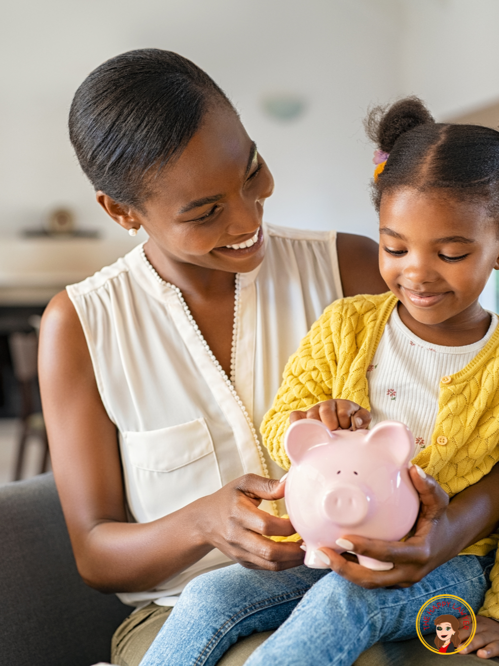 Mother and young daughter with a piggy bank representing how a trust can help manage and protect a minor child's inheritance.