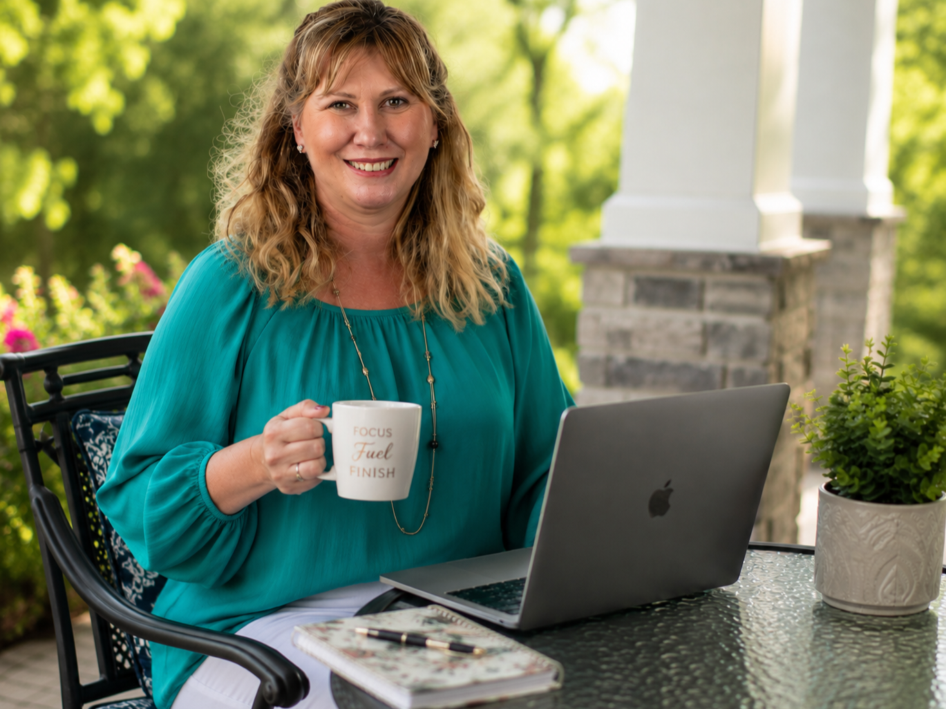 Kristen Mackintosh, estate planning attorney in Garner, North Carolina, enjoying coffee while working outdoors and helping families prepare for life's important moments.