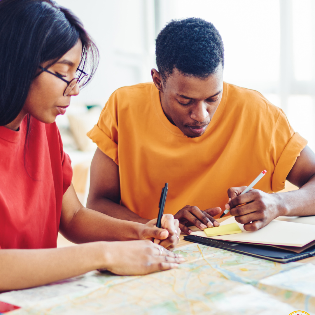 Parent and college-age student reviewing paperwork together before college, including important legal documents for young adults in North Carolina.