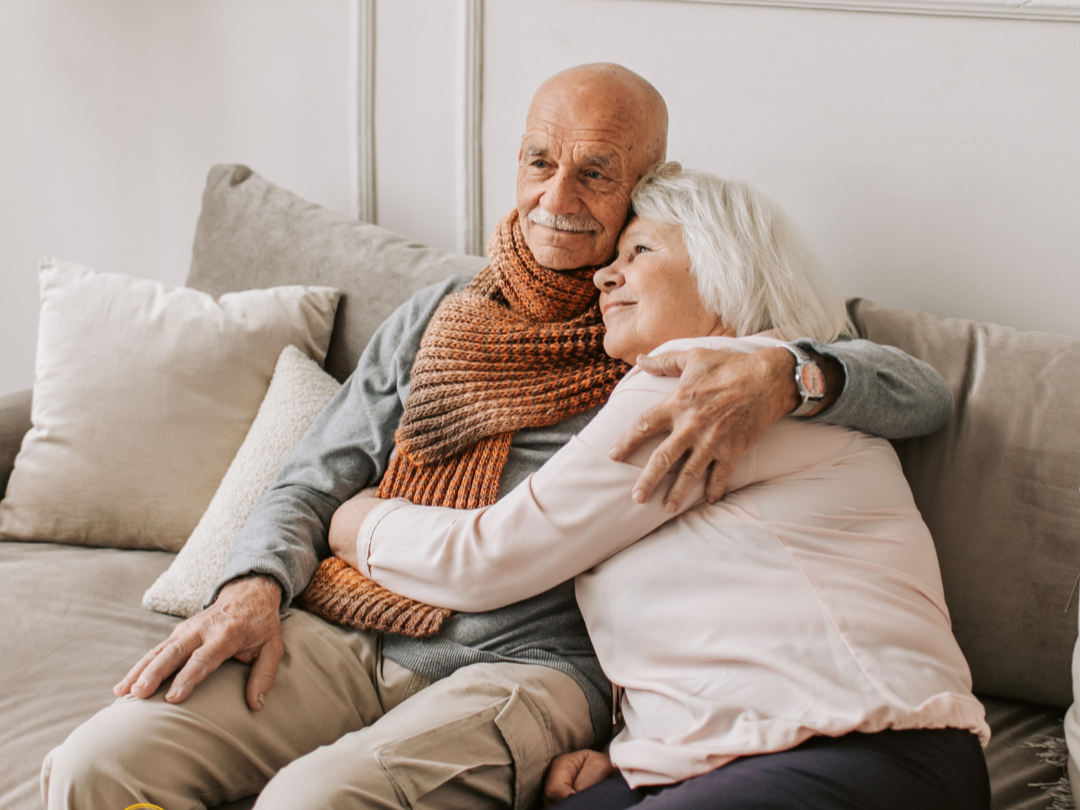 Older couple sitting together at home, representing thoughtful estate planning and long-term peace of mind for families in Garner, North Carolina.