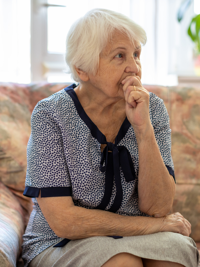 Elderly woman in North Carolina contemplating long-term care and Medicaid eligibility decisions