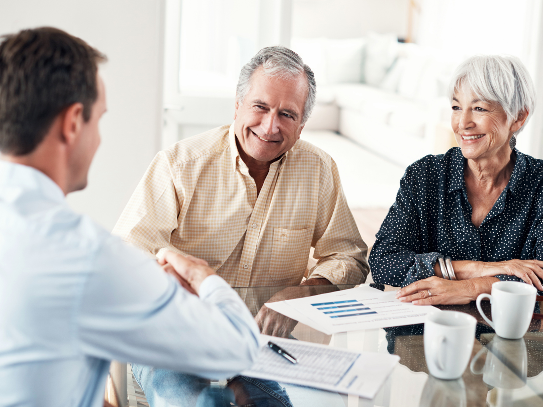 Couple meeting with elder law attorney to discuss Medicaid planning and asset protection in Garner North Carolina