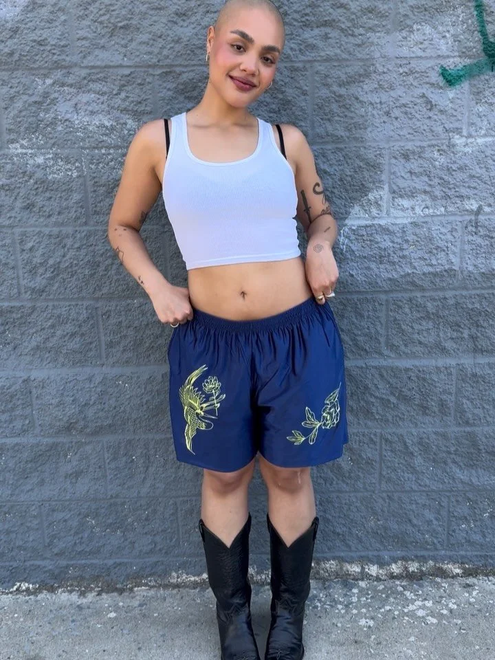 Our limited merch run is LIVE 💙 bralette and athletic shorts available online or in studio while supplies last. You know we&rsquo;ll be wearing the full fit all summer long 🌞