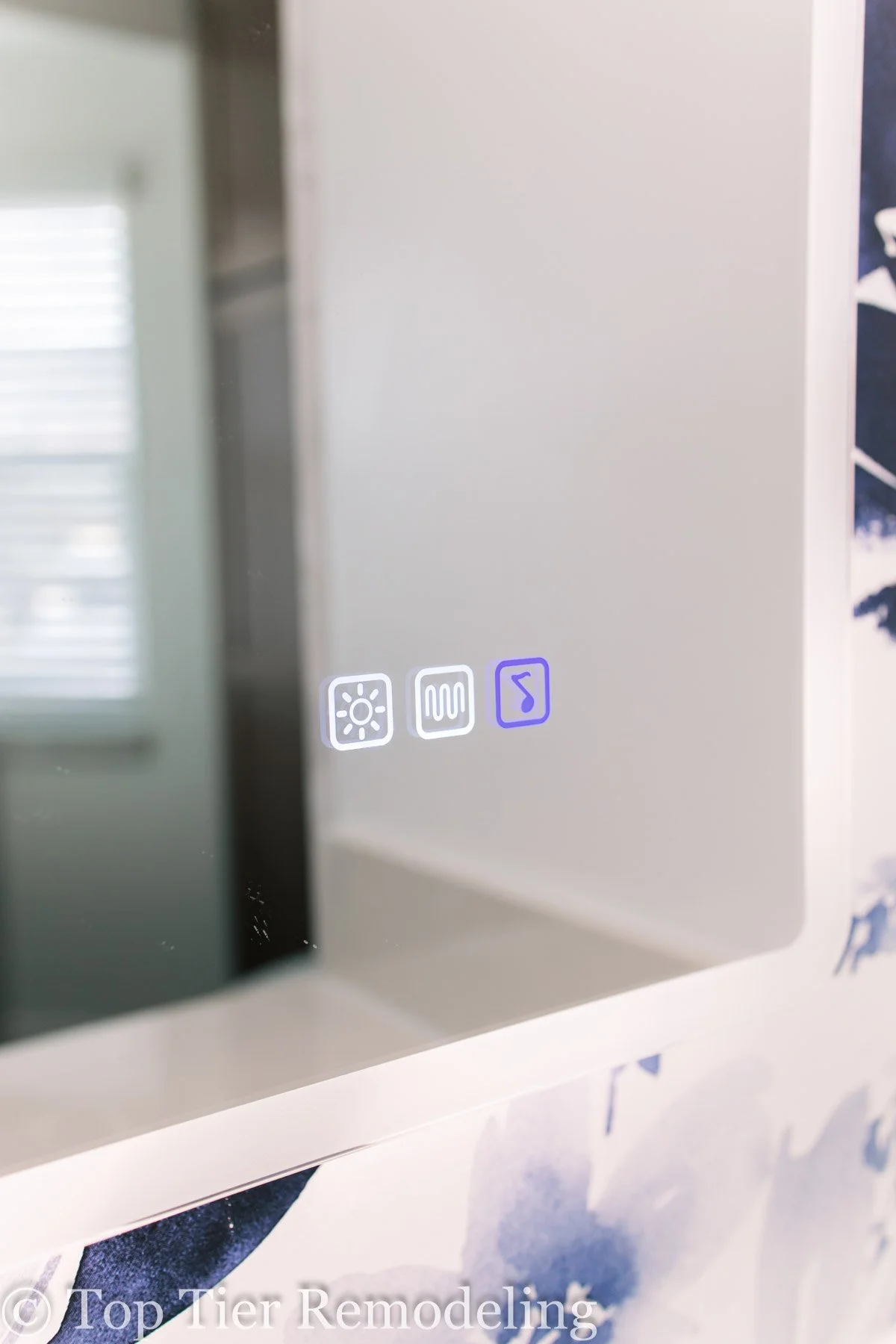 Close-up of a microwave control panel with three touch buttons: brightness, heater, and a square with a line, on the right side of the microwave door.