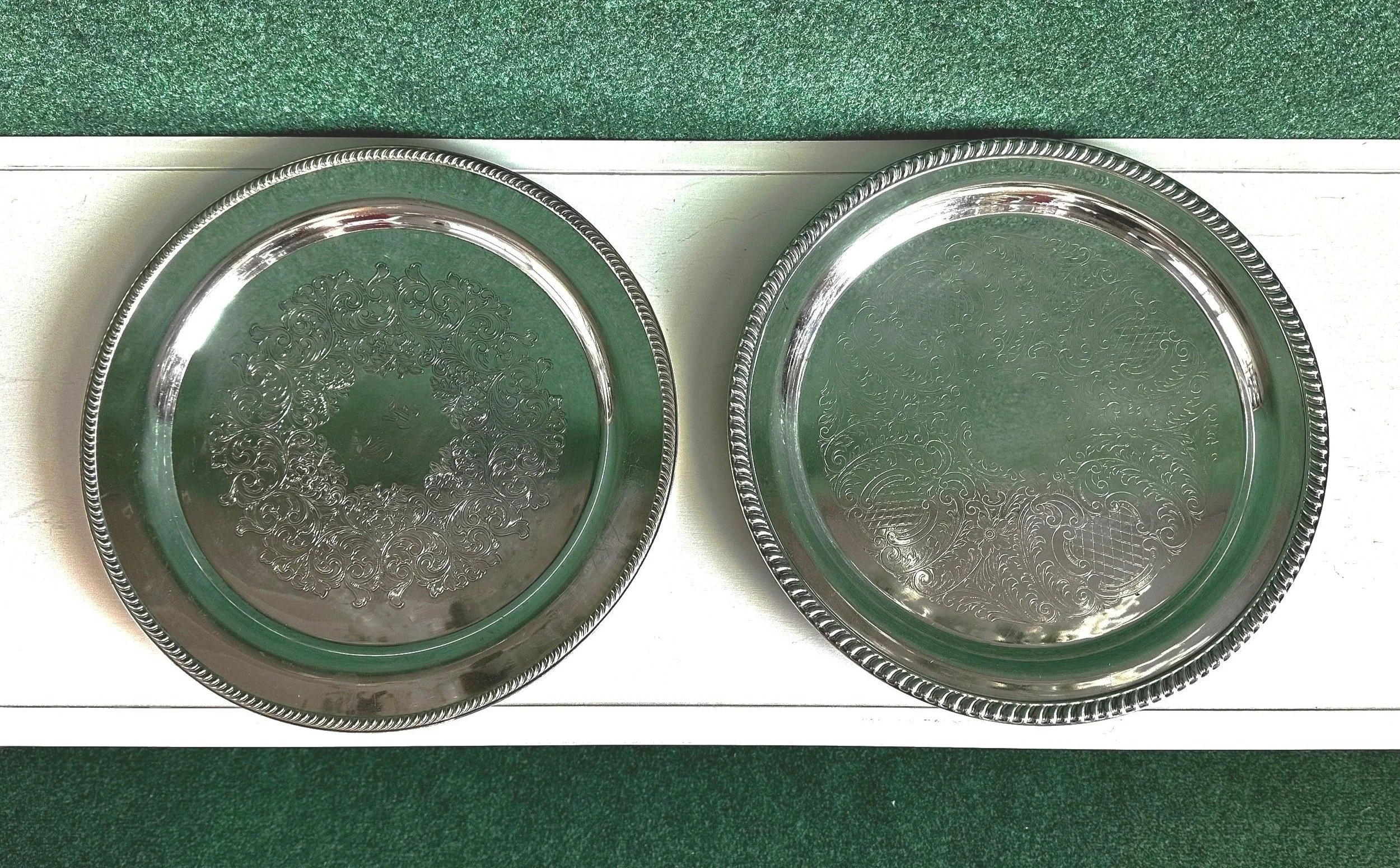 Pair of vintage round silver platters with etched detailing—classic rental serveware for weddings, showers, and upscale Tri-Cities events in Kennewick, Pasco, and Richland, WA.