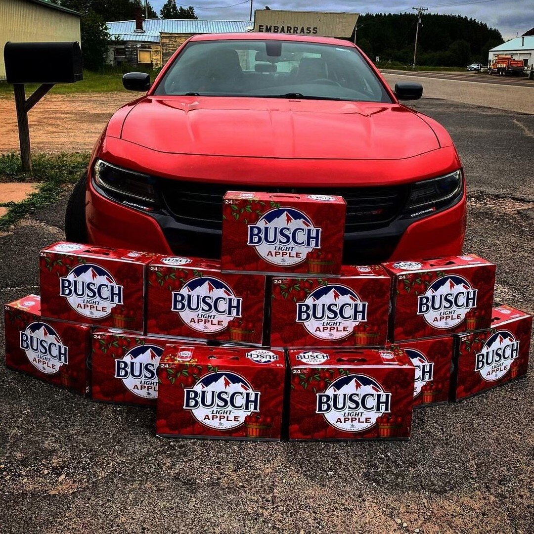 Why am I posting a picture of a dozen or so 30-packs of Busch Light Apple stacked in front of a car in Embarrass, Minnesota? Great question!

Last month, the folks @vinepair asked me if I wanted to write a story about beer drinkers' continued love fo