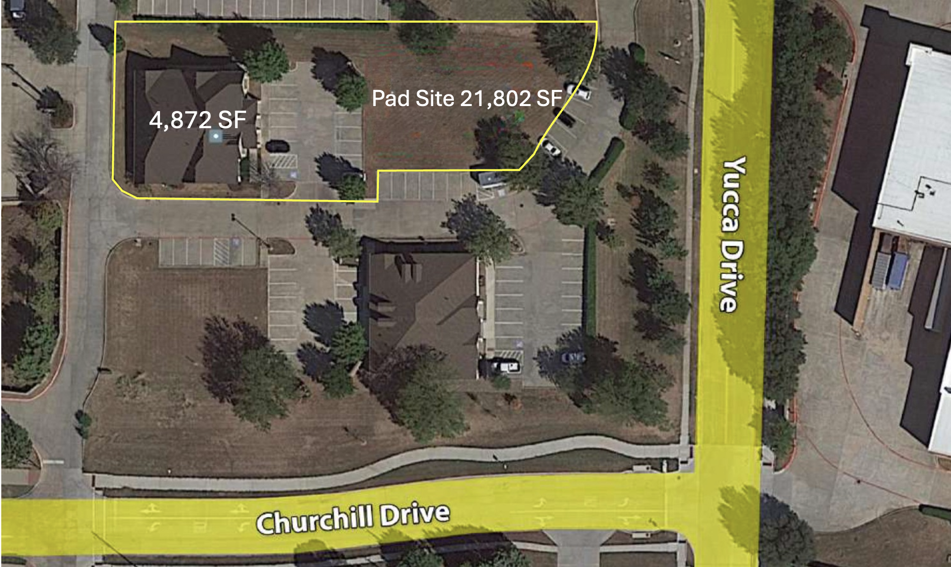 Aerial view of a parking lot with two buildings and surrounding trees, along with labeled areas indicating 4,872 square feet and 21,802 square feet, located between Churchill Drive and Yuca Drive.