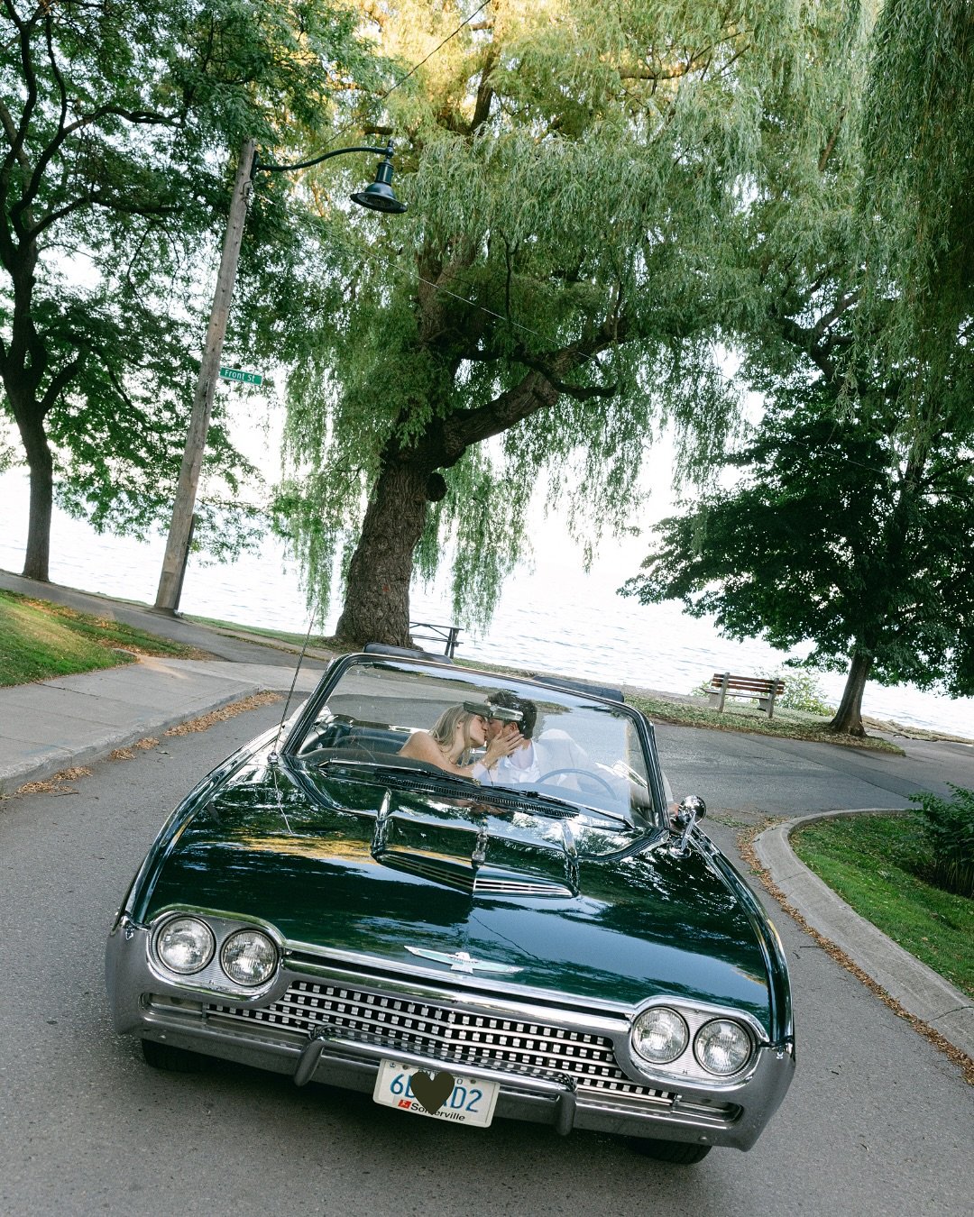 A vintage Thunderbird, a lakeside town, and an effortless love story that feels like it could be straight out of a movie. 

From windswept drives to sweet moments with their pup, this engagement session was all about celebrating romance in its most t