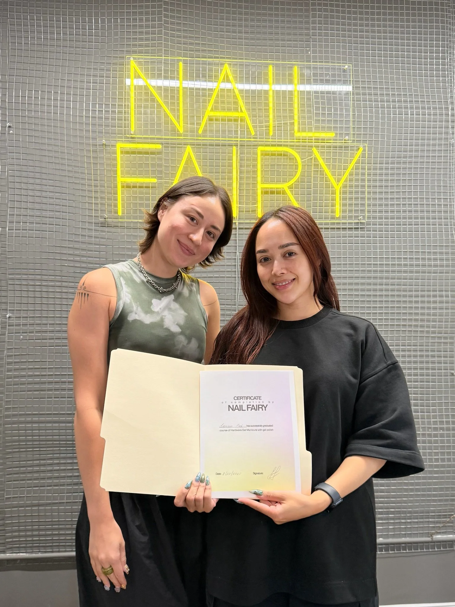 Beginner nail technician practicing Gel-X application during class