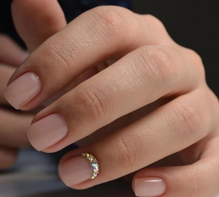 Rhinestone nail art on gel nails — application technique at Nail Fairy NYC salon