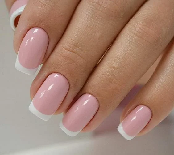 Builder gel applied on natural nails in Midtown NYC — prevents breakage and adds arch structure