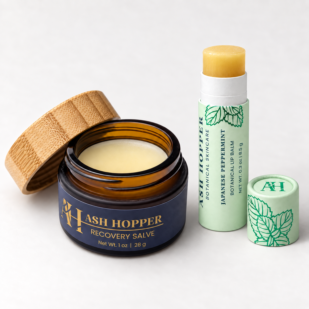Closed mint cap beside open balm.png