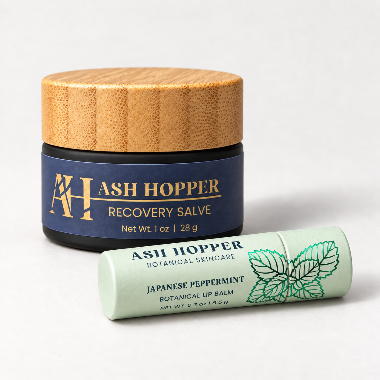 Mint lip balm beside salve jar.png