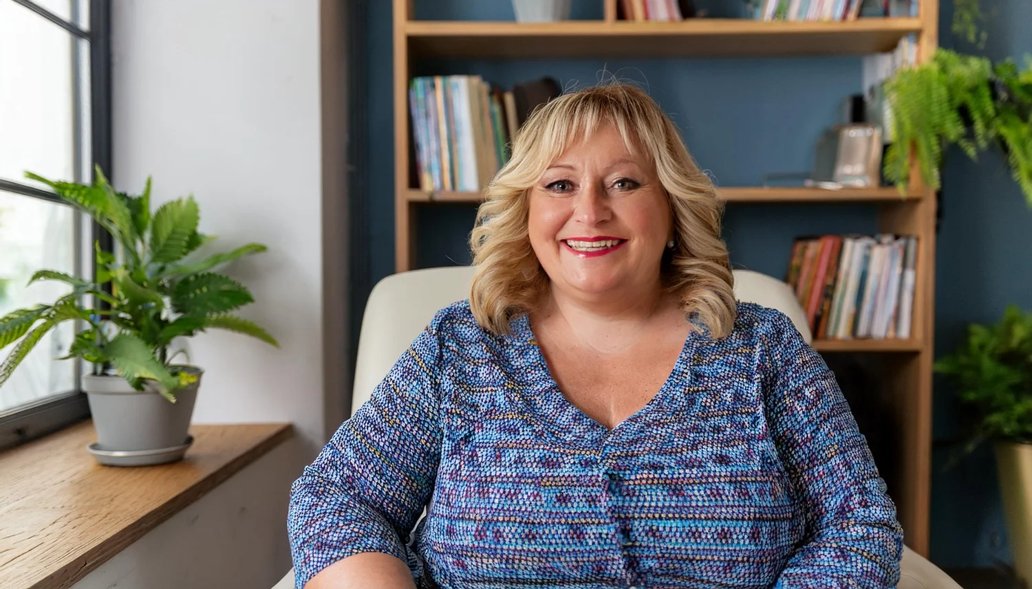 A woman in a warm, relaxed therapy session