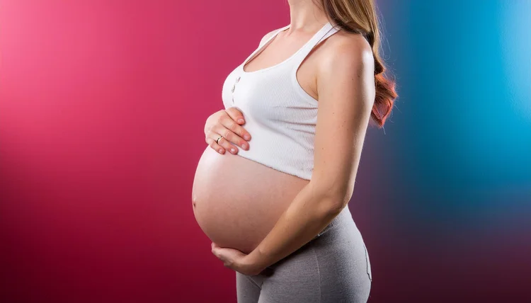Pregnant woman looking comfortable and well