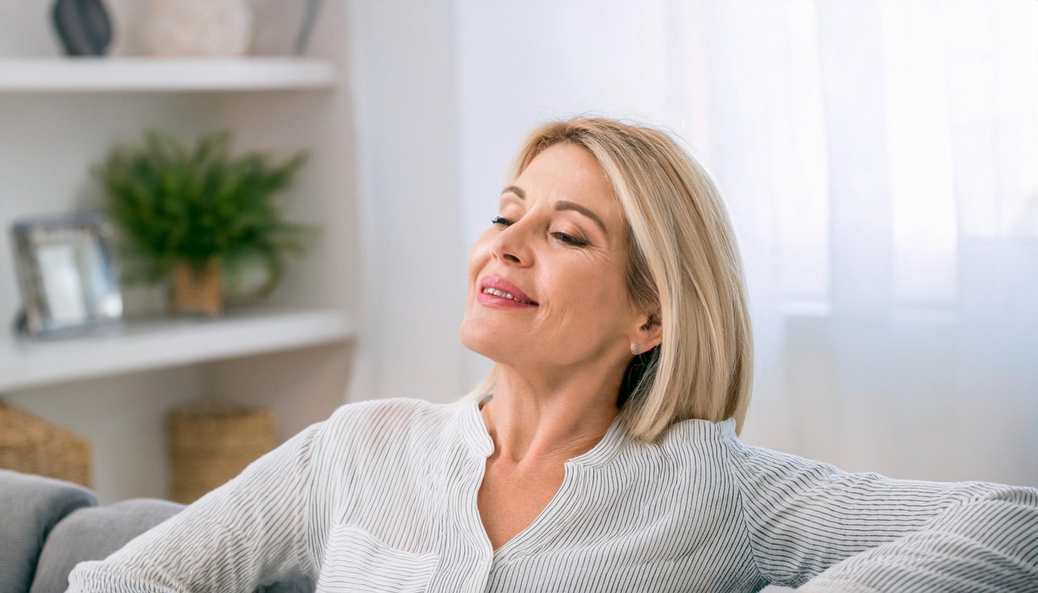 A woman relaxed and content at home