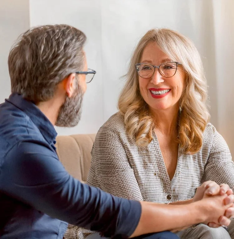 A couple in a relationship counselling session with a counsellor
