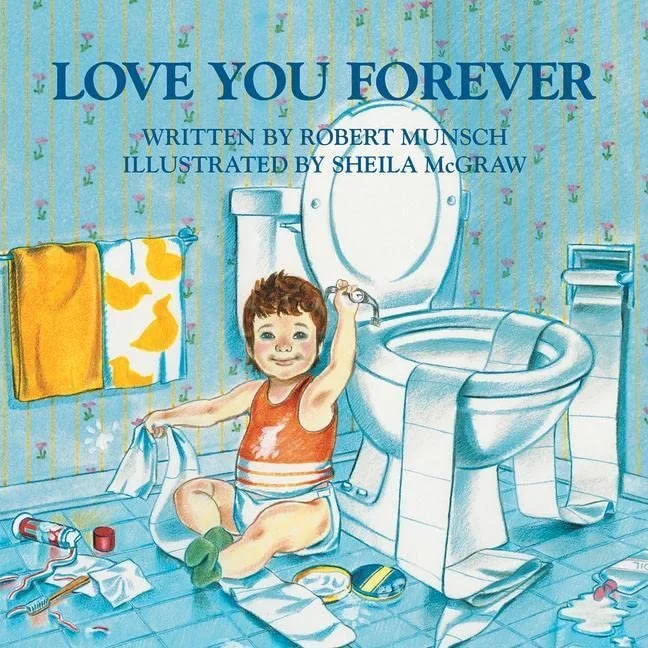 Cover of a children's book titled 'Love You Forever' with an illustration of a young boy sitting on the bathroom floor next to a toilet, smiling and holding a piece of toilet paper, with bathroom items scattered around.
