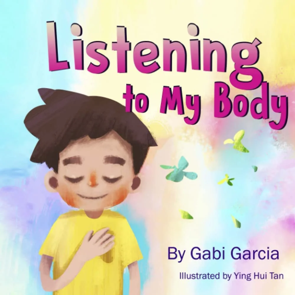Children's book cover titled 'Listening to My Body' by Gabi Garcia, illustrated by Ying Hui Tan, featuring a smiling boy with eyes closed, hand on chest, in front of a colorful, pastel background with butterflies.
