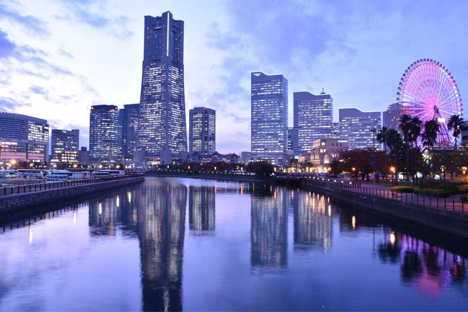 Yokohama's skyscrapers reflect in the water